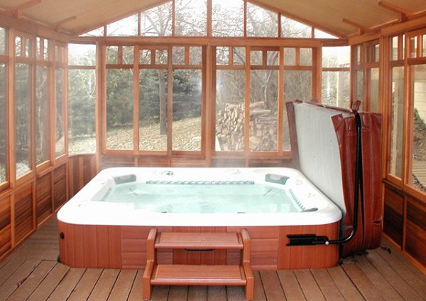 chalet gazebo interior view with a hot tub