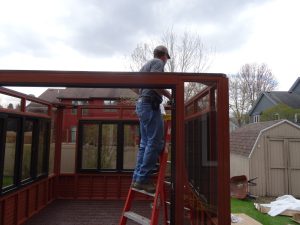 5. Install the roof header on top of the gazebo walls.