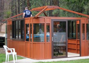 7. Raise the dome box with 4 attached corner rafters onto the walls of the gazebo.