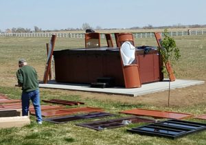 1. To start, it is best to layout all pieces of the gazebo for easy access and start by raising the corners.