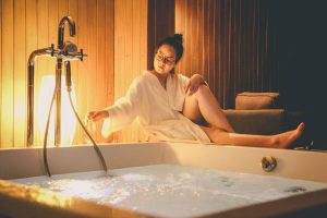 women beside hot tub