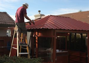 12. Attach Roof Panels one side at a time.