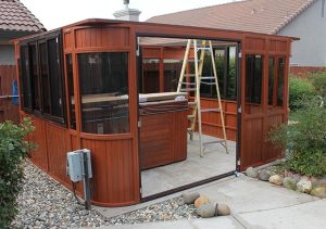 7. Attach the Header to top of the walls. In this photo the door frame is installed off center on the long 14 foot side of the gazebo. Note that the door frame can be installed center on the 14 foot side if desired. Also, the door frame can be installed on the 12 foot side of the gazebo in lieu of the Window Wall/Skirt as the door frame and Window Wall/Skirt dimensions are identical.