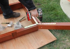 8. On the ground next to the gazebo, attach the 4 Corner Rafters to the Dome Box.