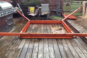 8. Lay the dome box upside down on the ground and attach the corner rafters.