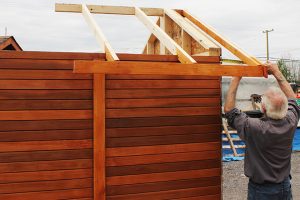 17. Align the smaller roof frame on the back wall gable with overhang of the roof frame from the backing to the facia board.