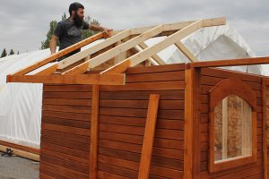 19. Align the opposite (bigger) roof frame on the other side of the gable.